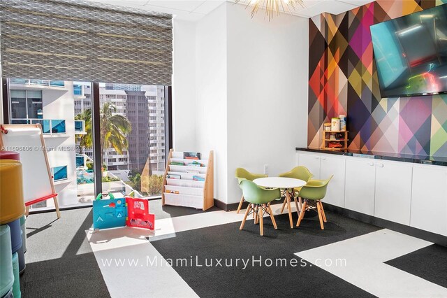 788 NE 23rd St Unit 2102, Miami, FL 33137 - recreation room featuring a wall of windows