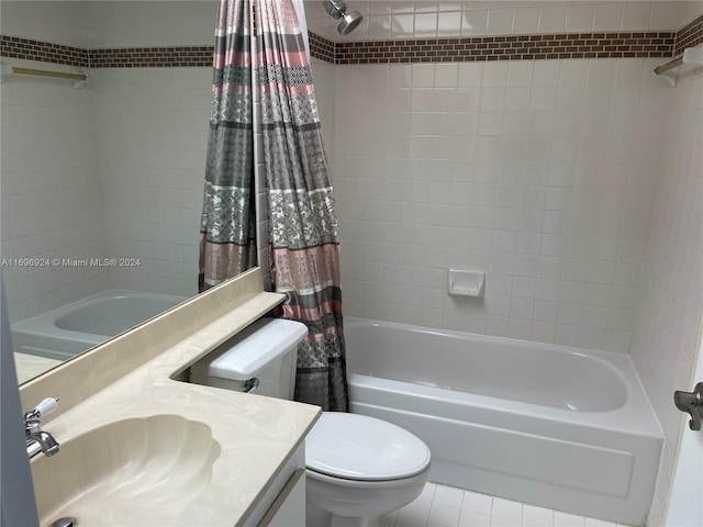 full bathroom with tile patterned flooring, vanity, toilet, and shower / bath combo