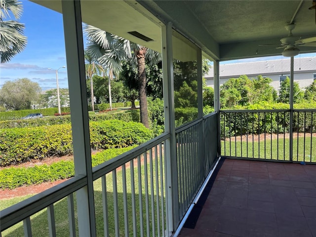 balcony featuring ceiling fan