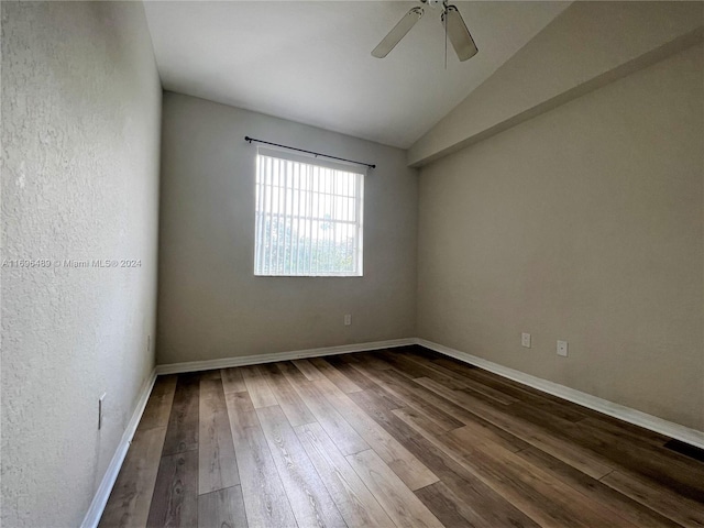 unfurnished room with wood-type flooring, ceiling fan, and lofted ceiling