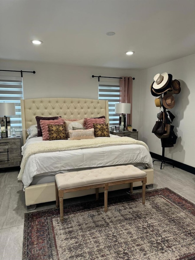 bedroom featuring multiple windows