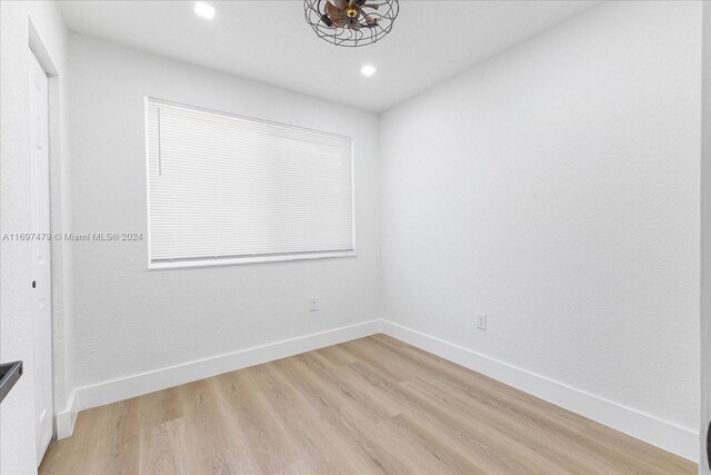 empty room with light wood-type flooring