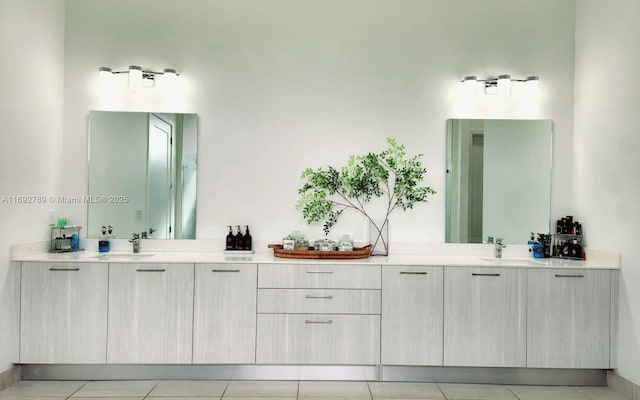 bathroom with a sink and double vanity