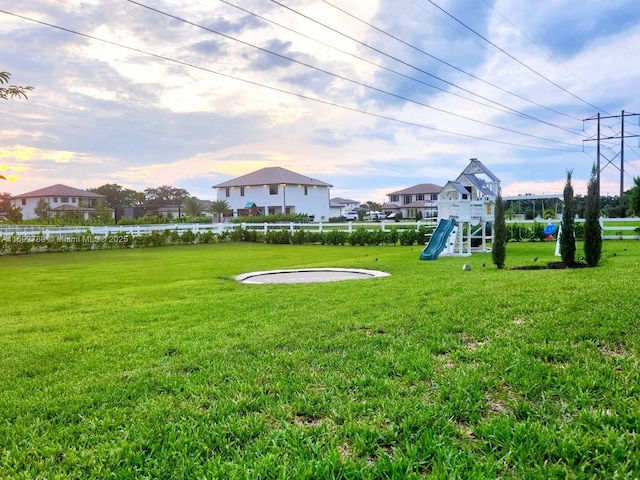 view of yard featuring playground community