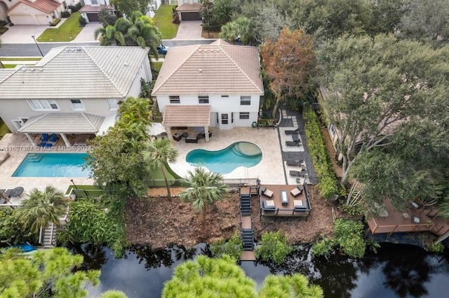 drone / aerial view with a water view