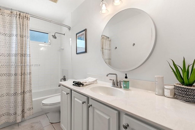 full bathroom with tile patterned floors, shower / tub combo with curtain, vanity, and toilet