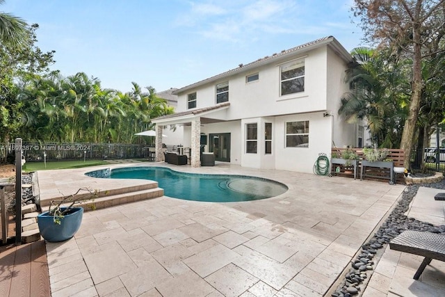 view of pool featuring outdoor lounge area and a patio area