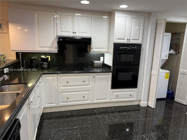 kitchen featuring backsplash, sink, black appliances, dark stone countertops, and white cabinetry