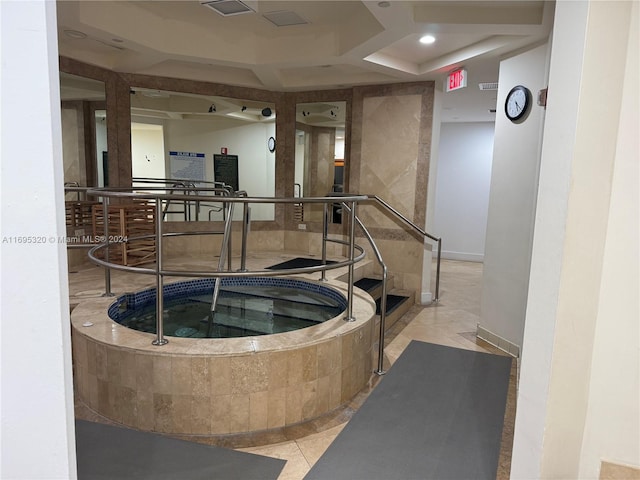 interior space with an indoor hot tub