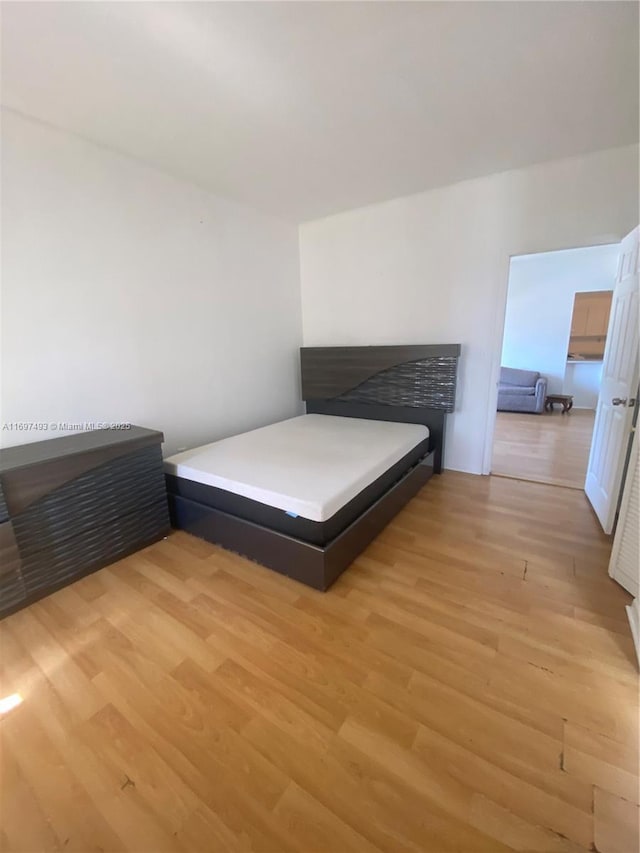 unfurnished bedroom featuring light hardwood / wood-style flooring