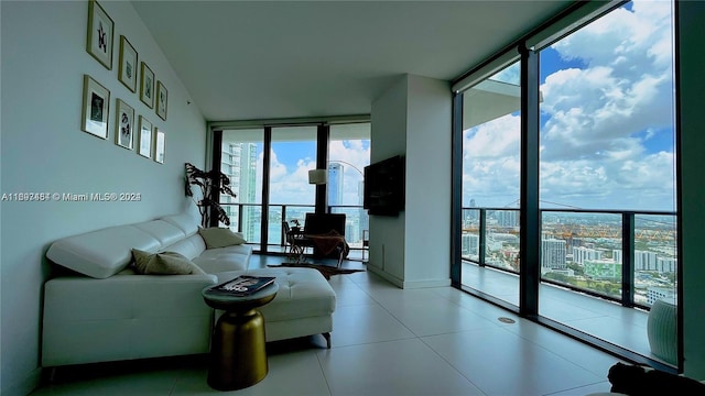 living room featuring floor to ceiling windows