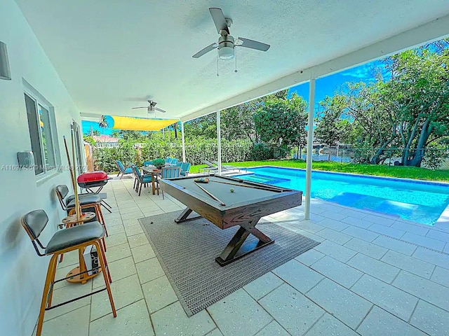 exterior space featuring ceiling fan and pool table