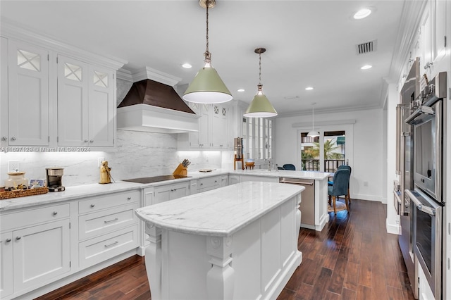 kitchen featuring white cabinets, a center island, dark wood-type flooring, and custom exhaust hood