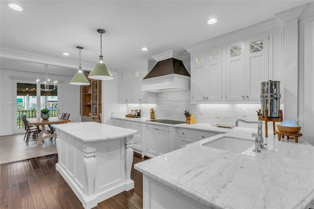 kitchen featuring a center island, white cabinets, sink, dark hardwood / wood-style floors, and custom range hood