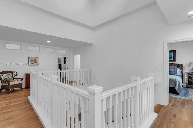 corridor featuring light hardwood / wood-style floors