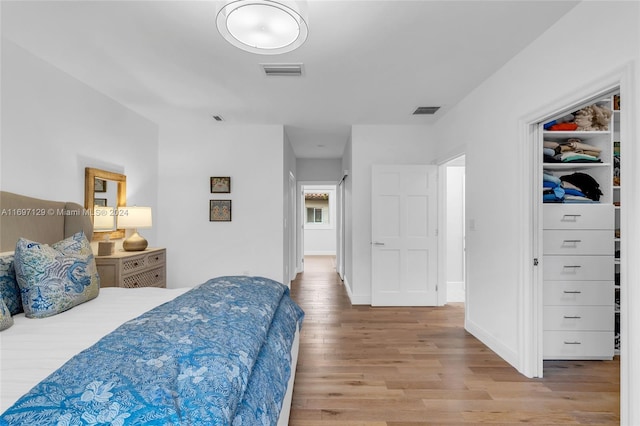 bedroom with light hardwood / wood-style floors