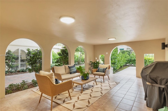 view of patio featuring outdoor lounge area and a grill