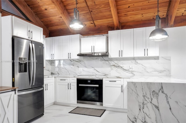 kitchen with appliances with stainless steel finishes, decorative light fixtures, wooden ceiling, vaulted ceiling with beams, and white cabinetry