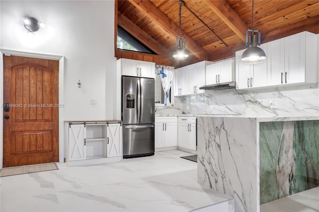 kitchen featuring pendant lighting, stainless steel fridge with ice dispenser, light stone countertops, white cabinetry, and wood ceiling