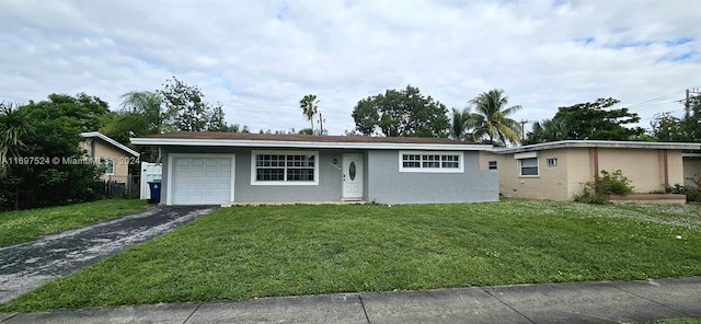 single story home with a garage and a front yard