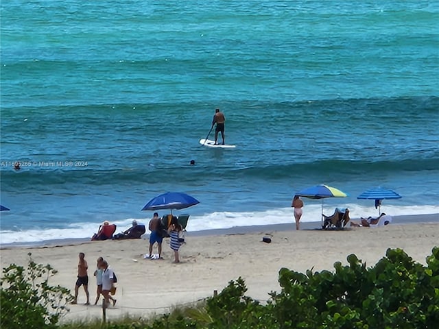 property view of water featuring a view of the beach