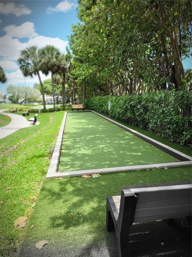 1201 S Ocean Dr Unit 304S, Hollywood, FL 33019 - surrounding community featuring a bocce ball area and a yard
