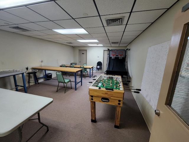 game room featuring carpet flooring and a drop ceiling