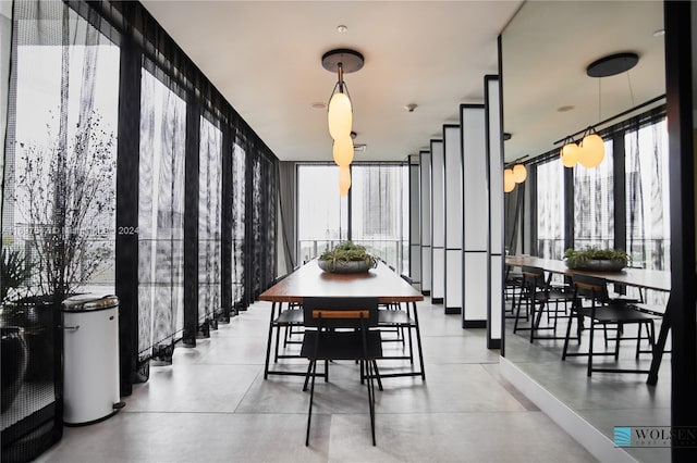 dining space with concrete floors