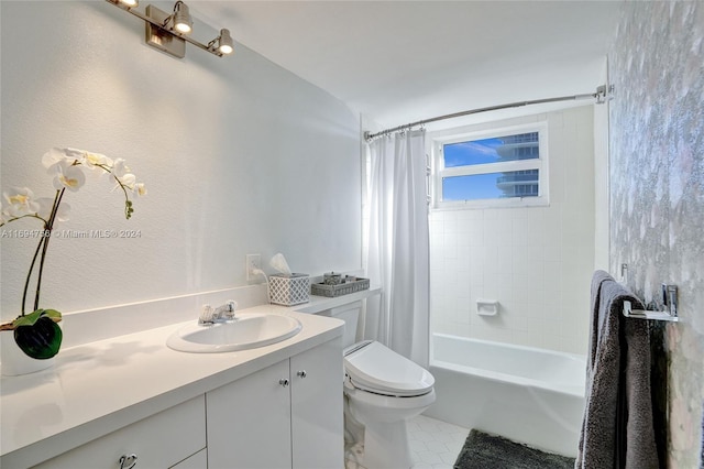 full bathroom featuring vanity, shower / bath combination with curtain, and toilet