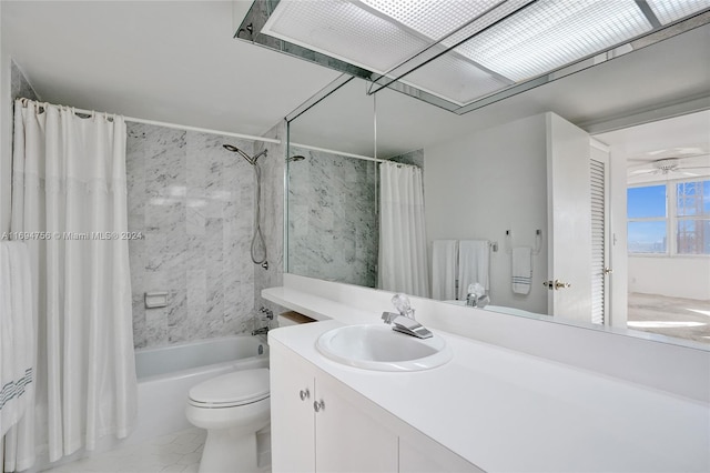 full bathroom featuring shower / bath combo, toilet, and vanity