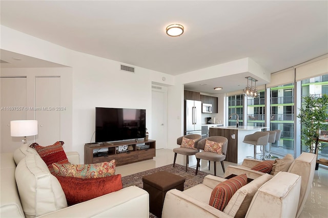 living room with a chandelier