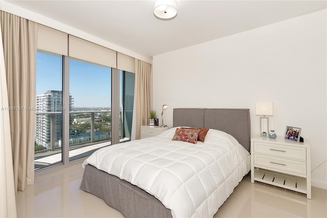 488 NE 18th St Unit 1700, Miami, FL 33132 - bedroom featuring a city view and light tile patterned floors