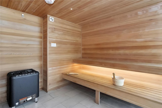 488 NE 18th St Unit 1700, Miami, FL 33132 - sauna with tile patterned floors, wood walls, and wooden ceiling