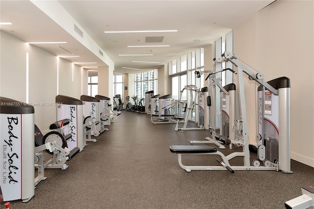 488 NE 18th St Unit 1700, Miami, FL 33132 - workout area with a wall of windows