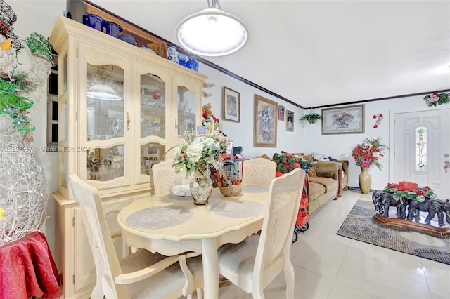 dining area with light tile patterned floors