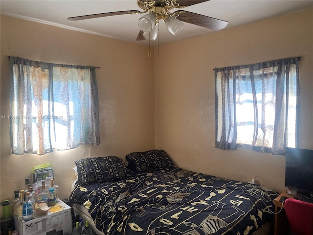 bedroom featuring ceiling fan