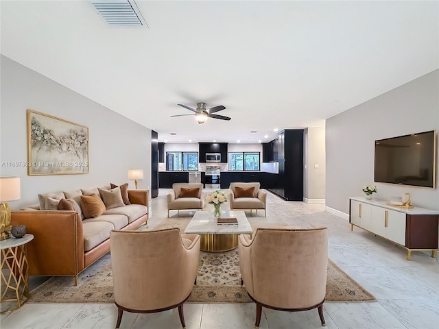 5210 SW 186th Ave, Southwest Ranches, FL 33332 - living area featuring ceiling fan and baseboards
