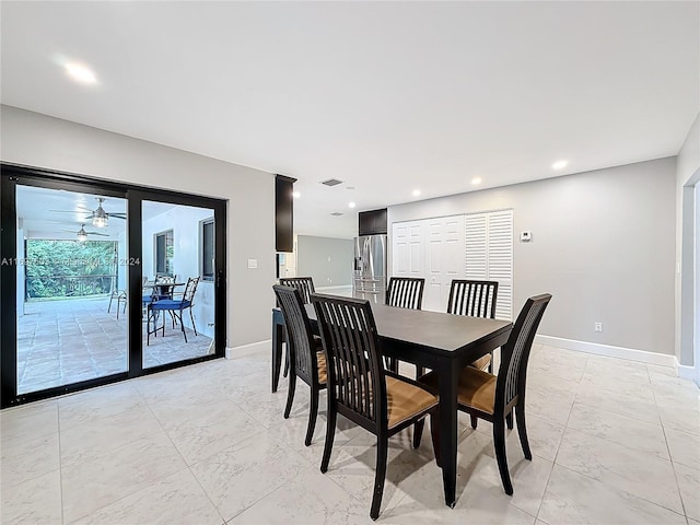 dining room with ceiling fan