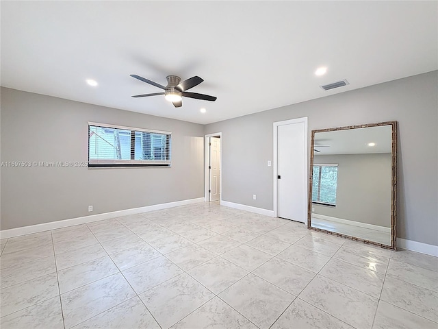 5210 SW 186th Ave, Southwest Ranches, FL 33332 - spare room featuring healthy amount of natural light, ceiling fan, recessed lighting, and light tile patterned flooring