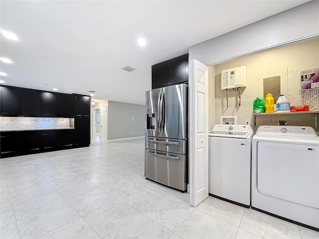 5210 SW 186th Ave, Southwest Ranches, FL 33332 - washroom with washer and clothes dryer, light tile patterned floors, and recessed lighting