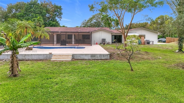 5210 SW 186th Ave, Southwest Ranches, FL 33332 - rear view of property featuring an outdoor pool, a patio, a yard, and a lanai