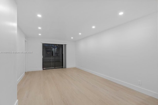 empty room with light wood-type flooring