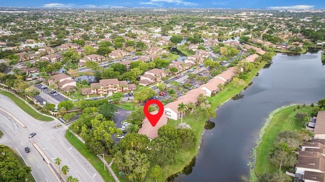 drone / aerial view featuring a water view