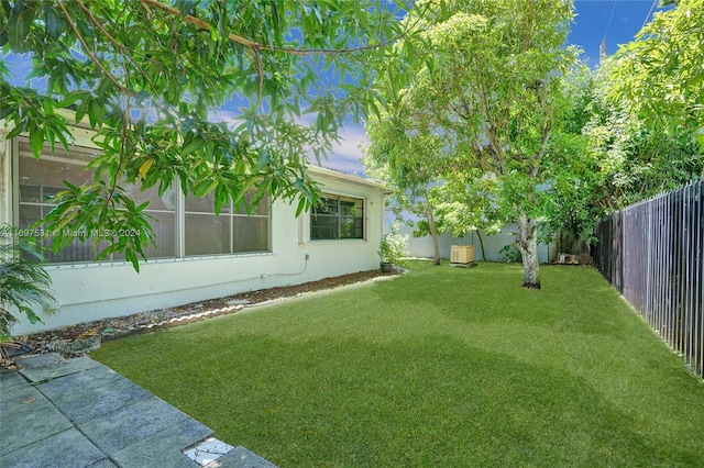 view of yard featuring a sunroom