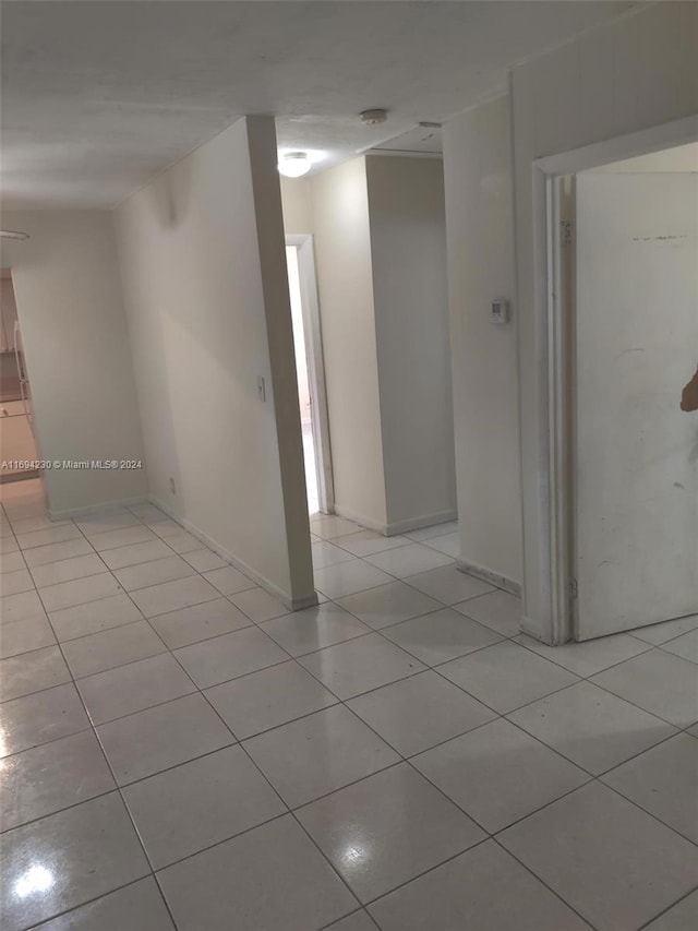 interior space featuring light tile patterned flooring