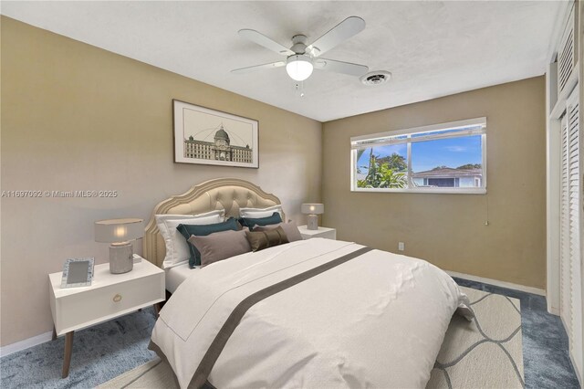 tiled spare room featuring ornamental molding and ceiling fan with notable chandelier