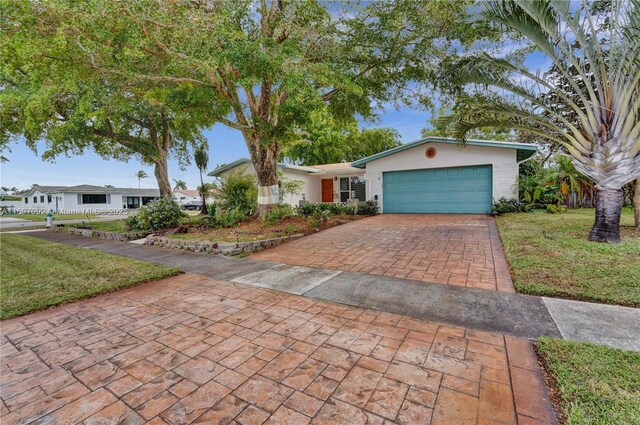 view of front of home with a garage