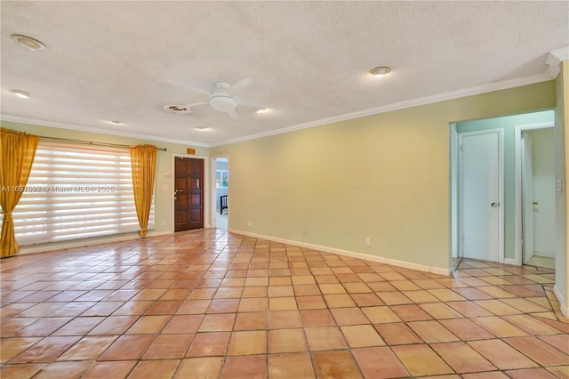 tiled spare room featuring ceiling fan, crown molding, and a textured ceiling