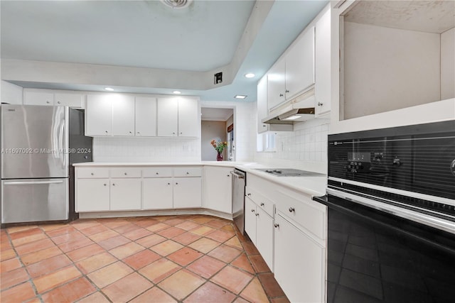 kitchen featuring white cabinetry, backsplash, and black appliances