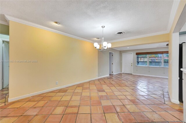 tiled empty room with ornamental molding, ceiling fan with notable chandelier, and a textured ceiling